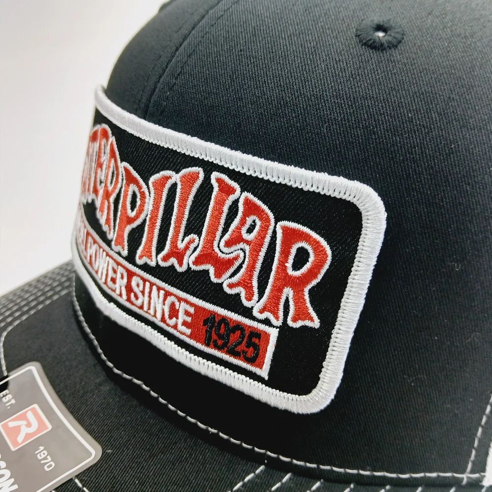 Caterpillar Black and White Trucker Cap
